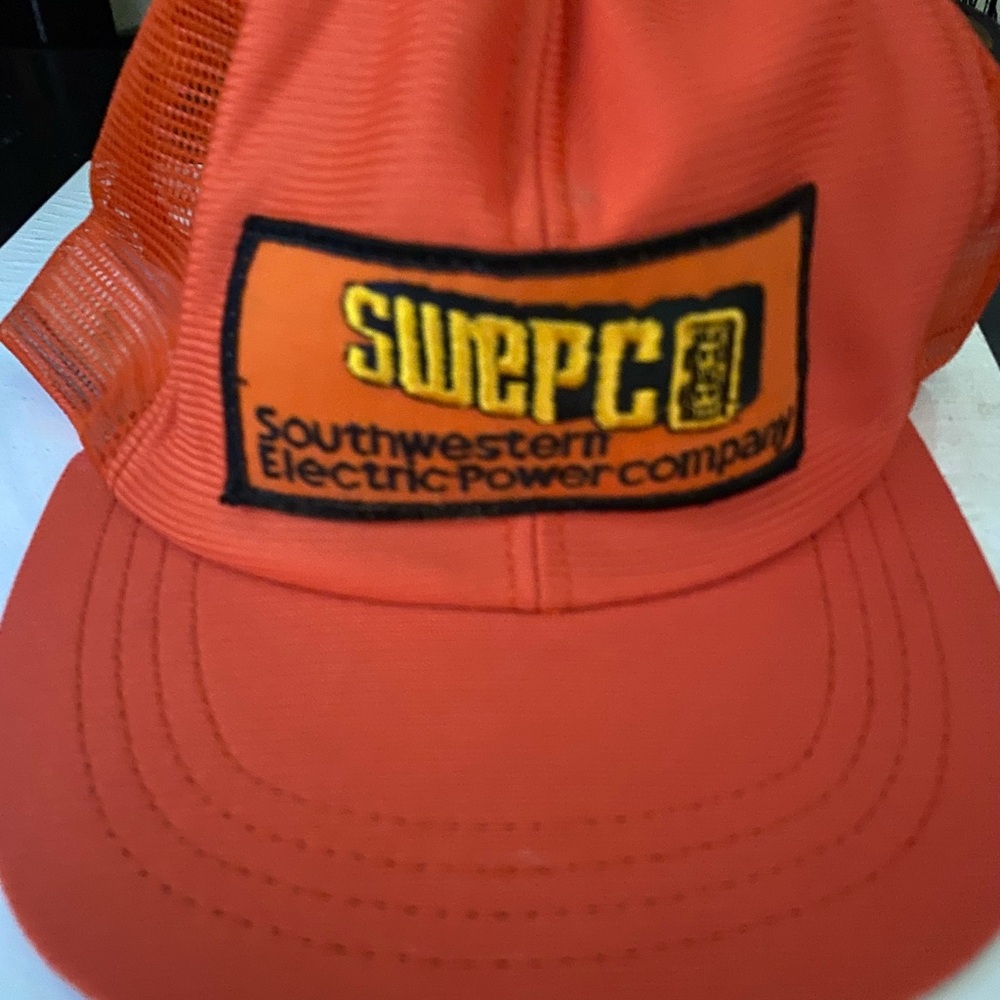 Source Unknown Orange Southwestern Electric Power Company (SWEPco) Trucker Hat